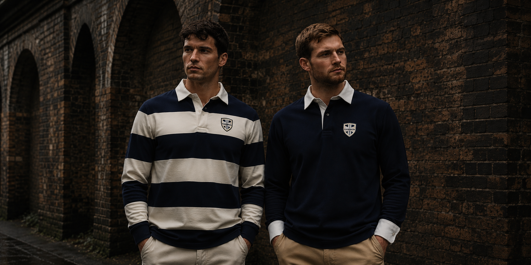 Two men wearing Gammon British-made Sporting Shirts including the relaxed Whitby fit and structured Stamford fit against industrial railway arches